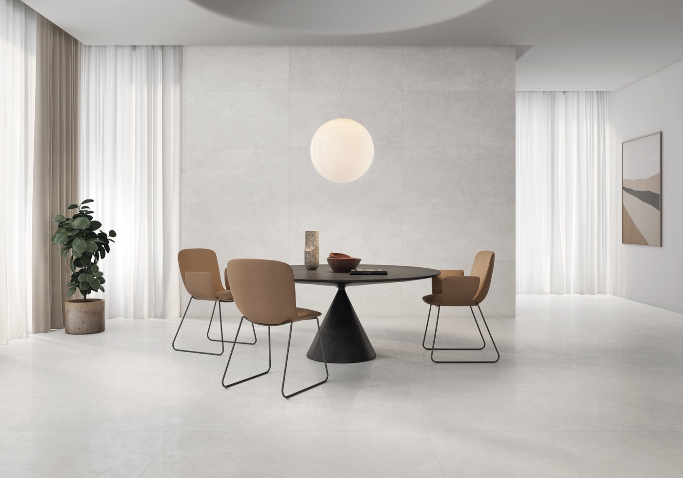 Comedor con pavimento y revestimiento efecto piedra gris claro de gran formato